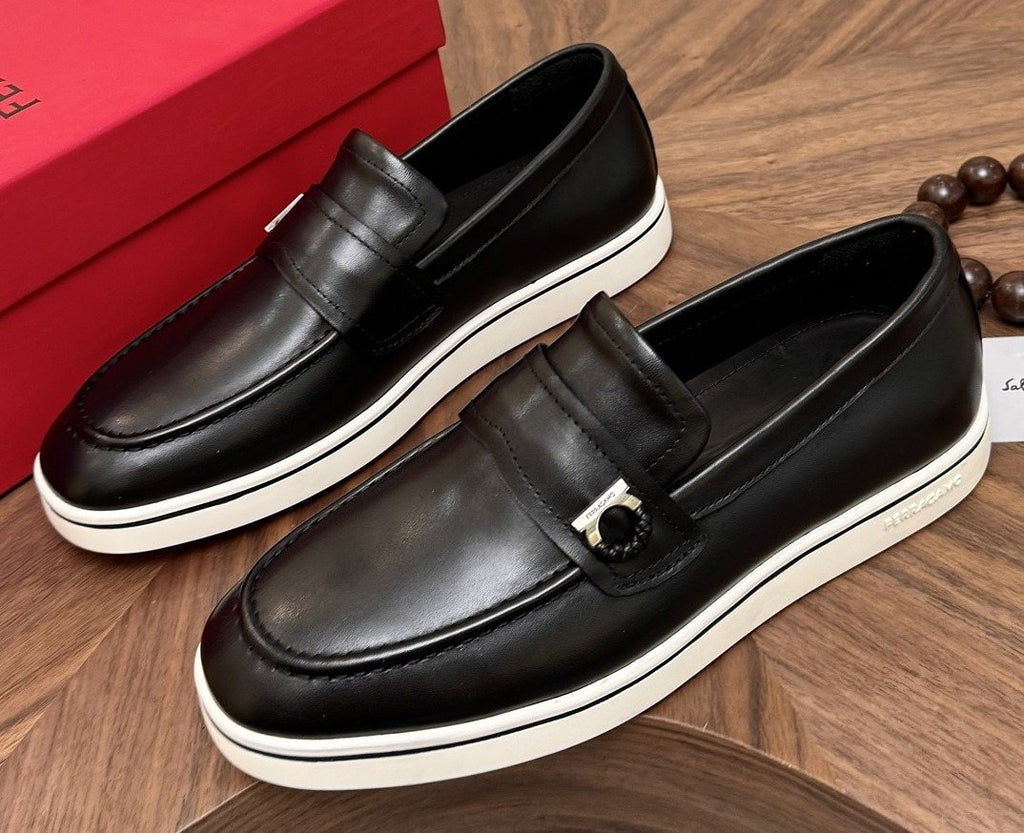 Salvatore Ferragamo Black Loafers with White Soles