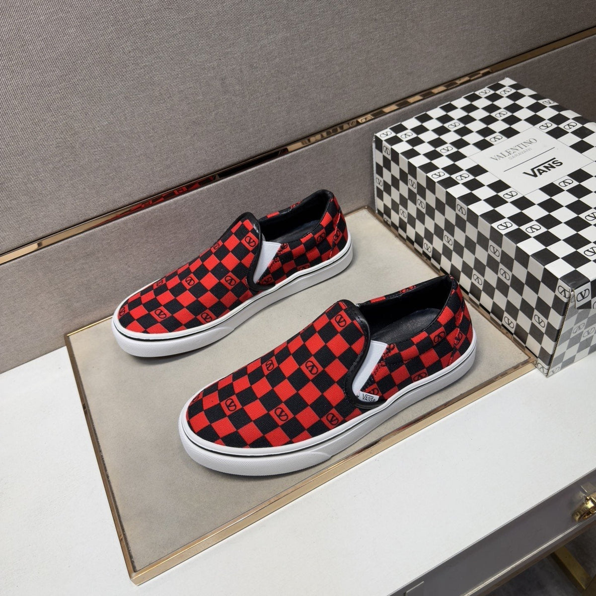 Vans Red and Black Checkerboard Slip-On Sneakers